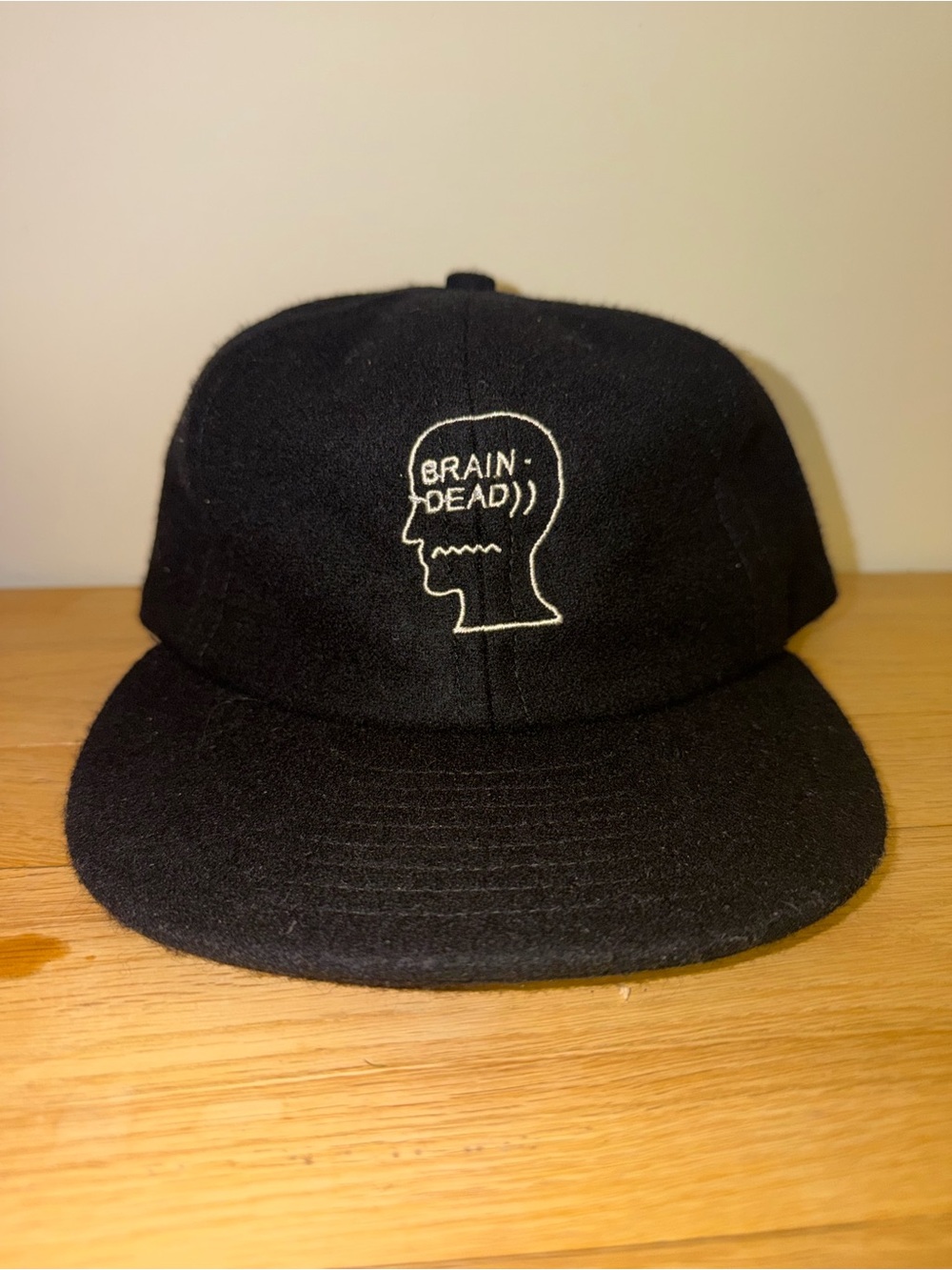 Brain Dead Black Cap with White Embroidered Head Logo